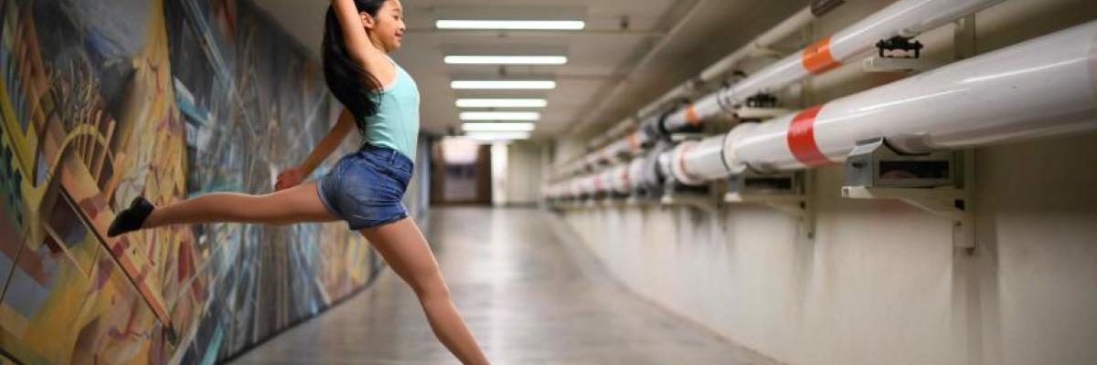 Aliyah dancing in a tunnel at the University of Manitoba